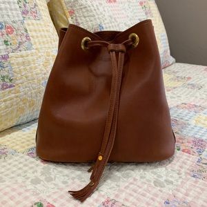 Urban Southern whole full-grain leather bucket bag with brass accents